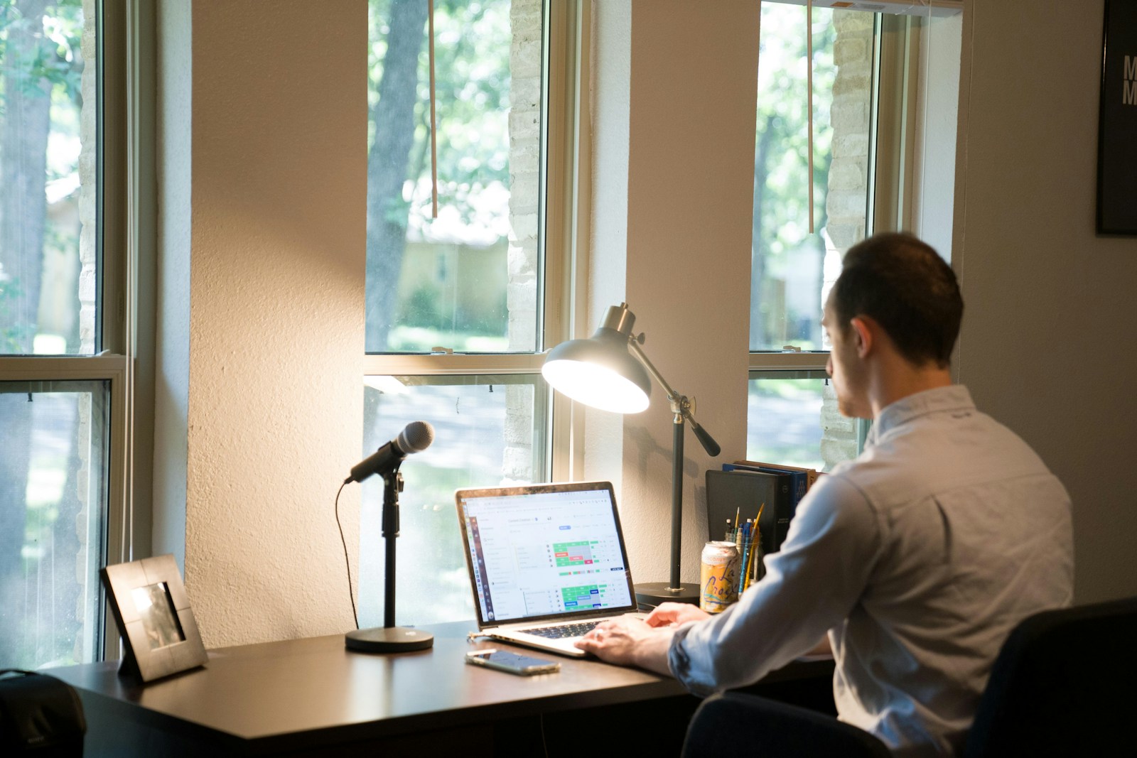 77 remote work man in white dress shirt sitting on chair using laptop com cu7kouq5fje
